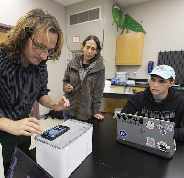 a photo of Dr. Lisa Taylor leading class