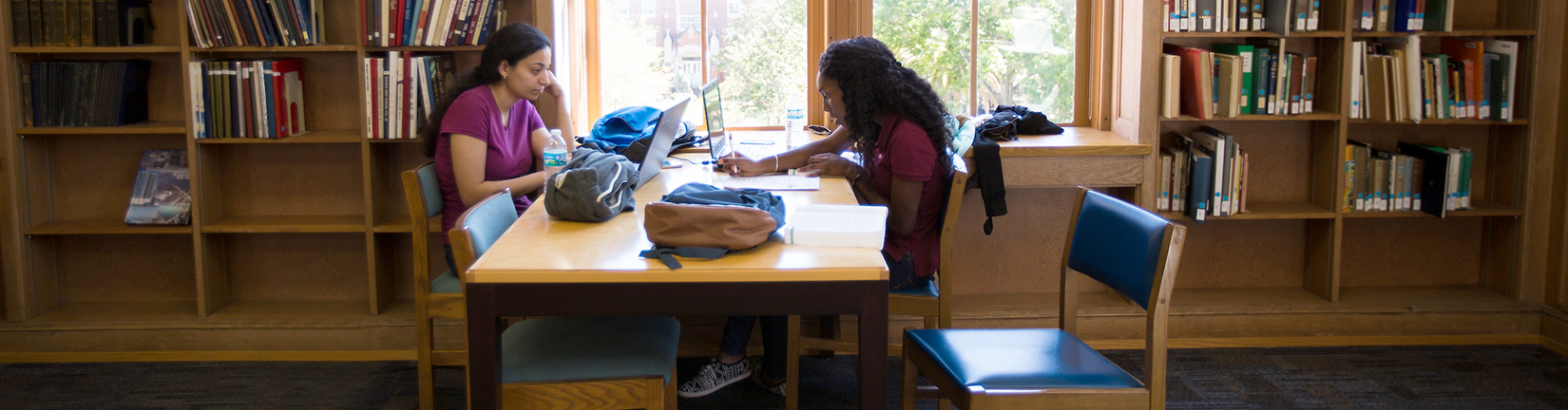 a photo of two female students studying