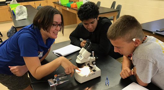 Rachel Atchison, graduate student in the Lucky lab, visited Mr. Haught's Environmental Science classes on October 25th to facilitate learning about ant diversity. Using microscopes, students compared morphological characteristics to identify the three different ant species they had collected the previous day on their high school campus.  